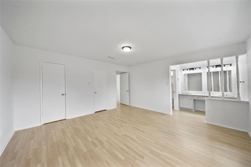 Main bedroom is spacious and full of character