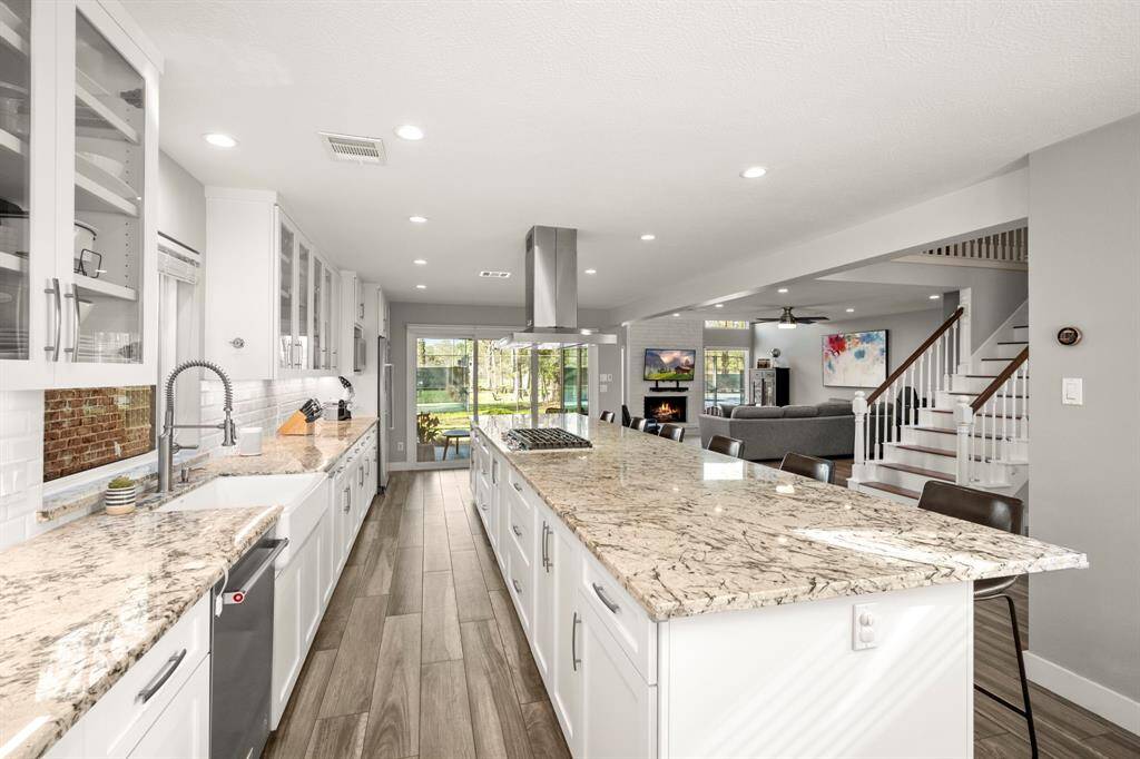 Double ovens and a gas cooktop make cooking for a crowd a breeze.