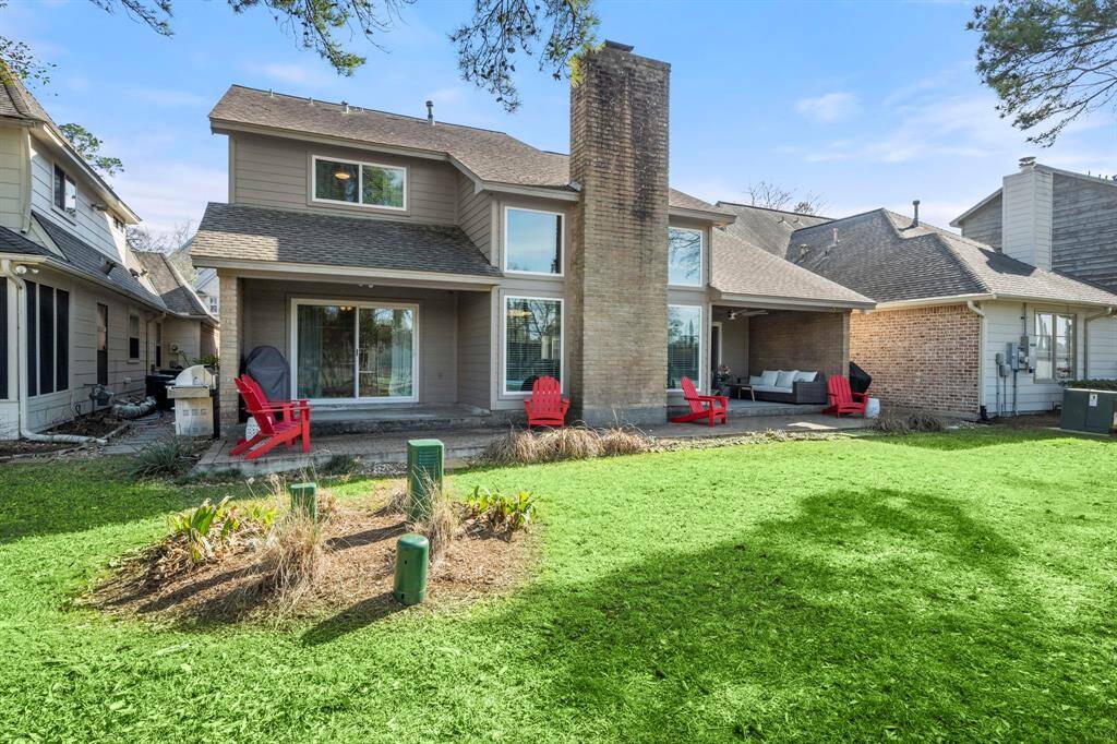Spacious patio offers cozy outdoor living space.