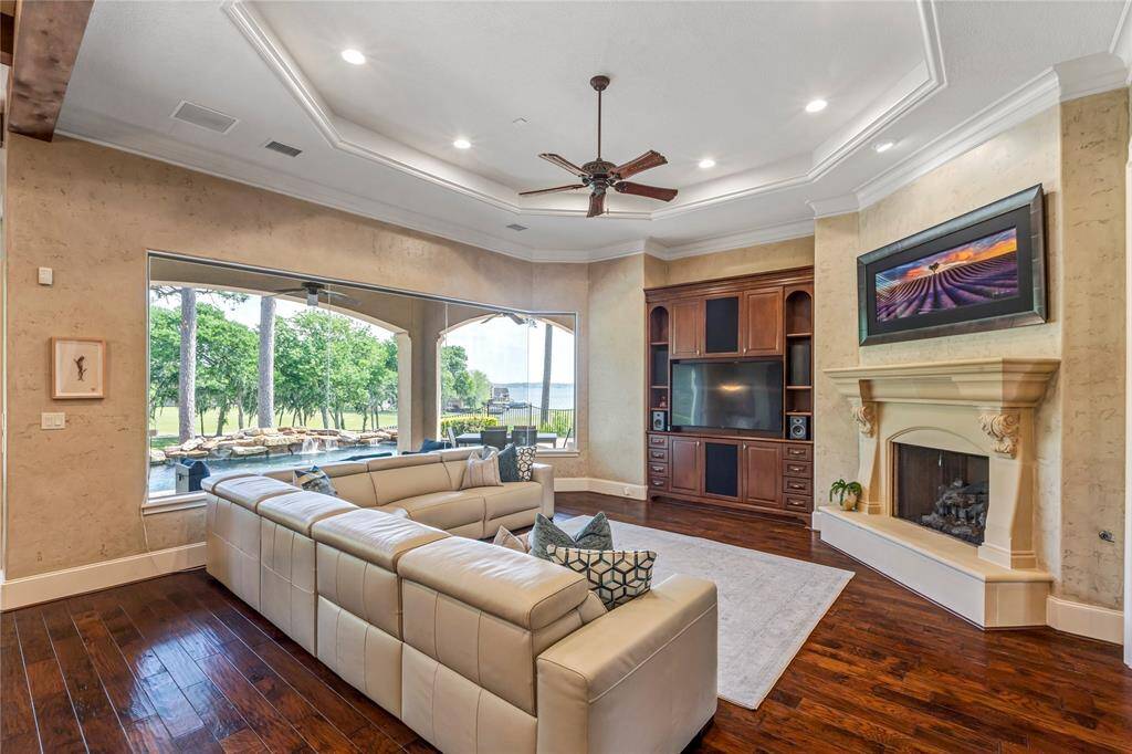 See the views you would have.  WOW!  Gas fireplace, wood floors, and tiered ceiling in this living space.