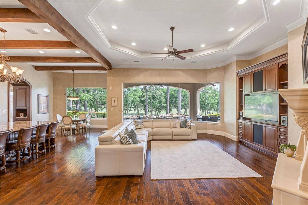 Living area with breakfast bar to the left.  Lots of natural light.