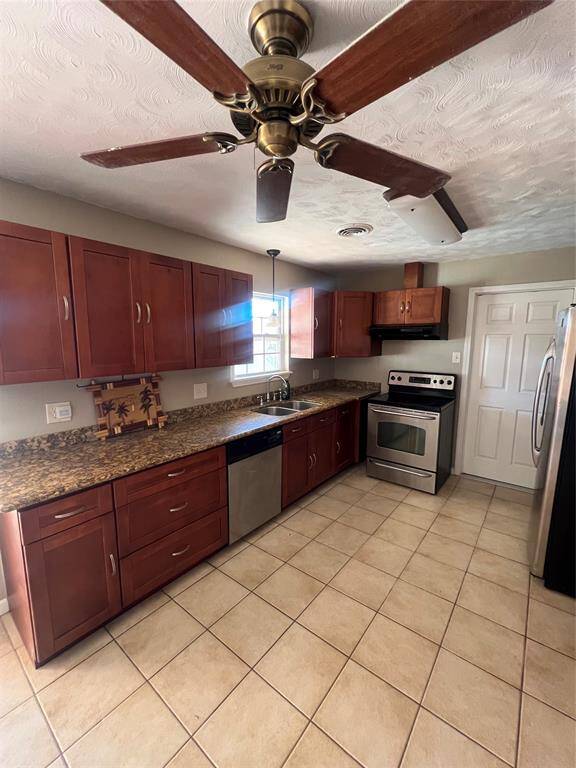 Other side of kitchen - more cabinets.