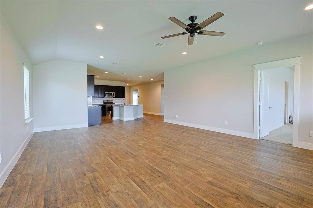 Open concept view Family room to Kitchen