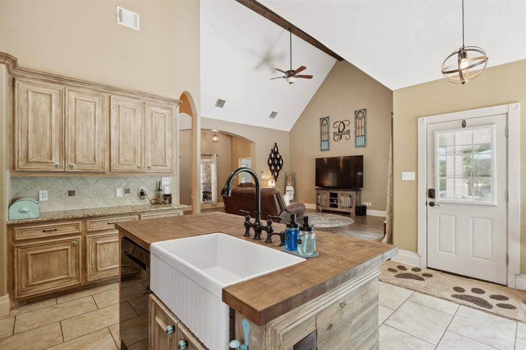 This owners retreat will make you feel like you've checked into a 5 star hotel!  Huge windows provide tons of natural light and amazing views of the yard and trees.  Notice the gambrel style ceilings which help keep this space light and bright.