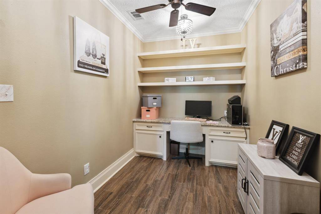Bedroom #4 measures approx 12x11 and includes cozy carpeting, wide base moldings, gambrel style ceilings, and a ceiling fan with lights.