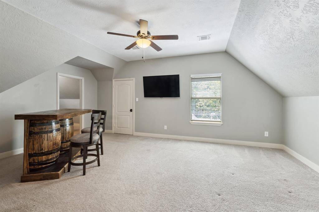 The first floor laundry space includes a utility sink and appliance storage. You'll appreciate it's location- just off the kitchen which makes multi-tasking easy!