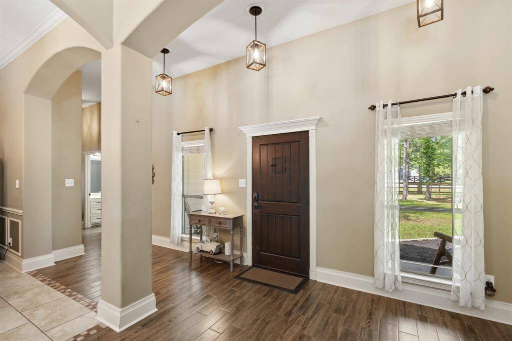 This home has been meticulously maintained and is move-in ready! Large windows throughout the home provide tons of natural light and great views in every room. You'll love the easy to keep clean tile floors in all of the public spaces of the home while the bedrooms offer comfy carpeting. Notice the neutral color walls and crisp white trim which will compliment any decorating style.