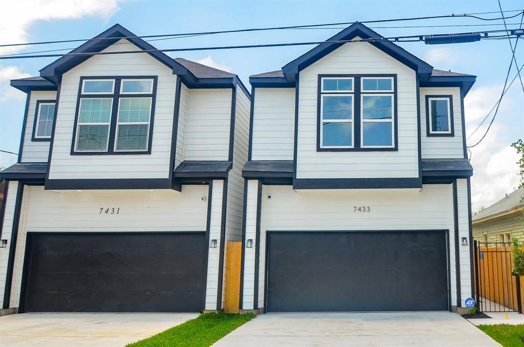 R & R BLUE SKIES LLC has completed another 2 story home featuring sleek white siding and black trim. 7433 Hezekiah Ln. includes a two-car garage and large windows for ample natural light. Perfect for those seeking contemporary style and functionality.