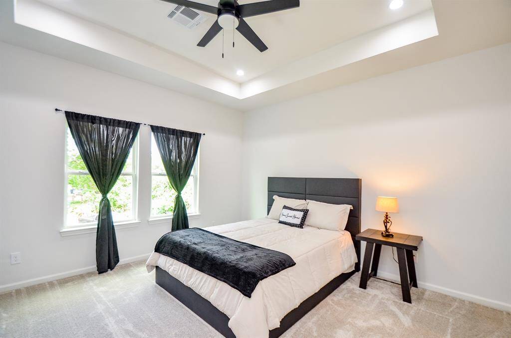 Another view of this spacious master bedroom.