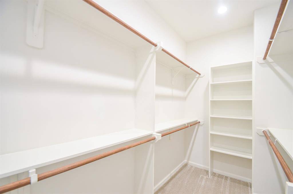 This closet offers more space than the 1st. Notice the added shelves which allows for more storage options.