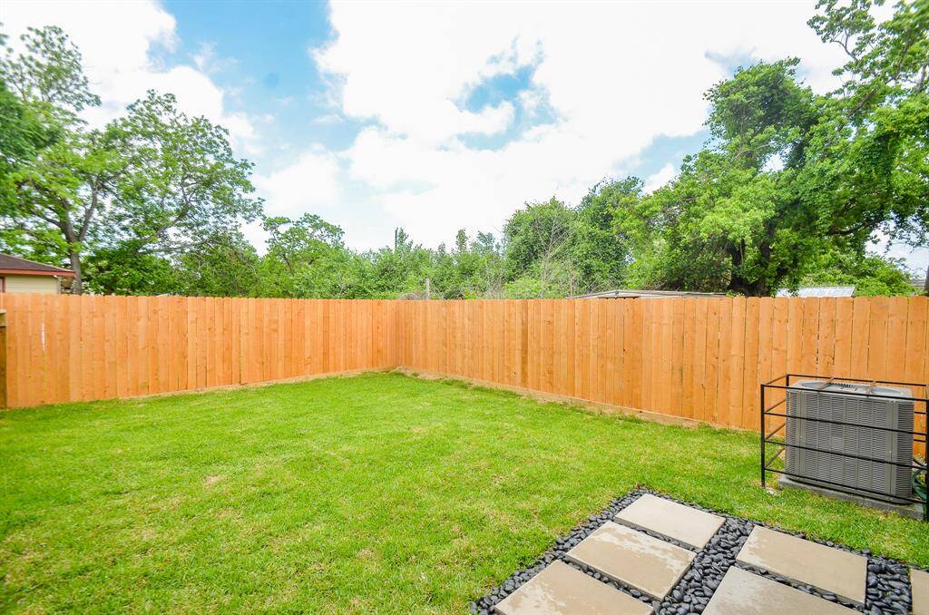 Fully fenced and sod backyard with over 750 s.f. of lush lawn for kids or pets to play.