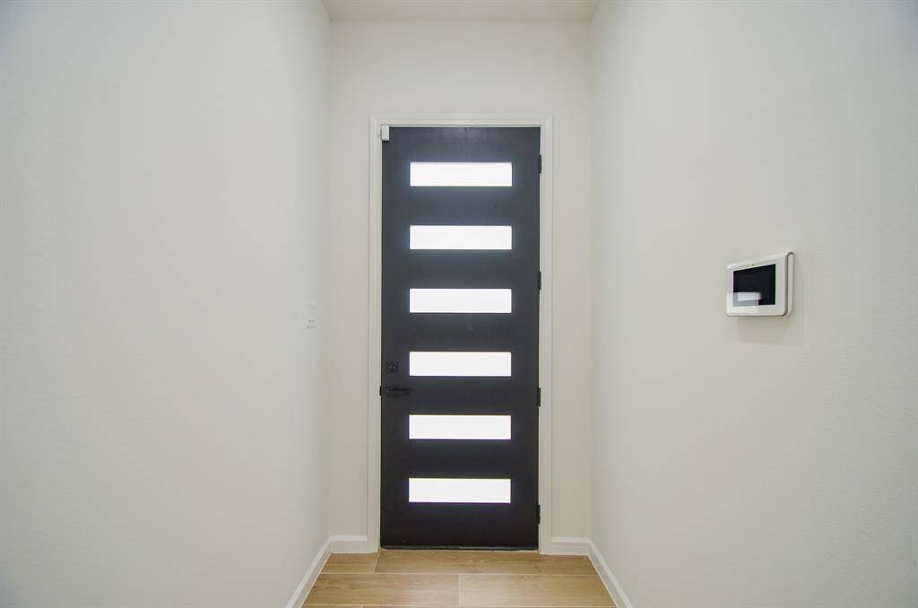 The whole home is prewired for security and can be accessed remotely. Camera Doorbell can also be answered remotely.