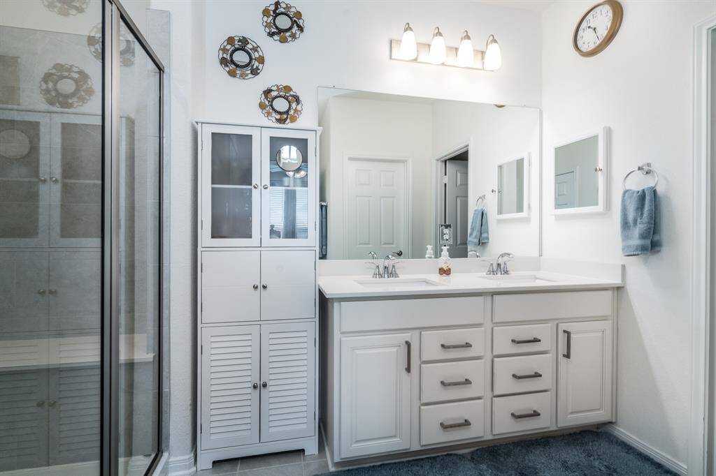 Primary bathroom with dual vanities