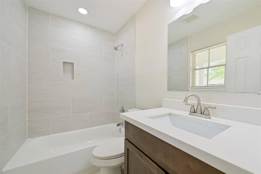 The mother in law suite has its own private bathroom, including a tub and shower.