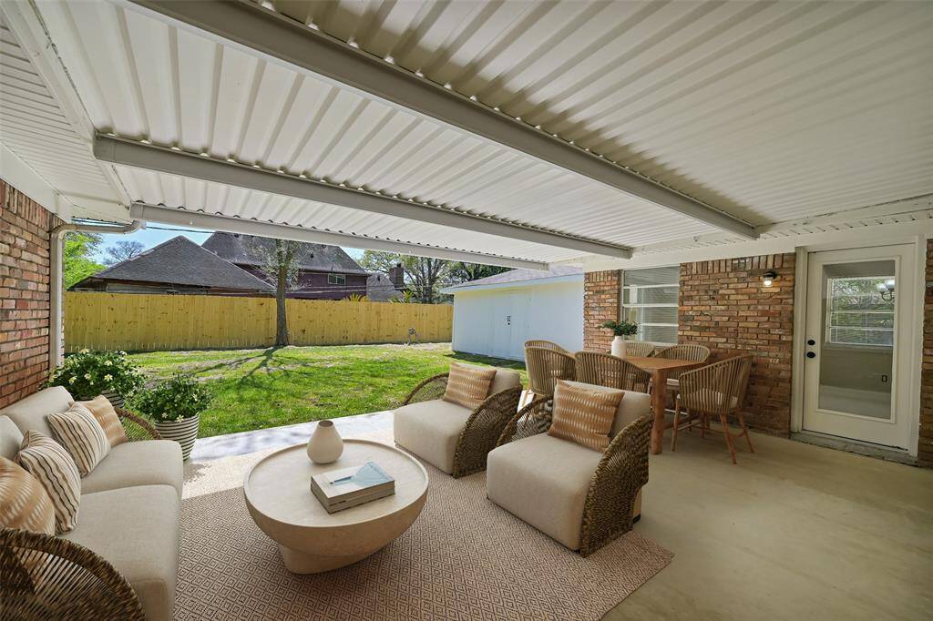 Enjoy evenings under the shade of your back patio, and enjoy a brand new full privacy fence surrounding the back yard.