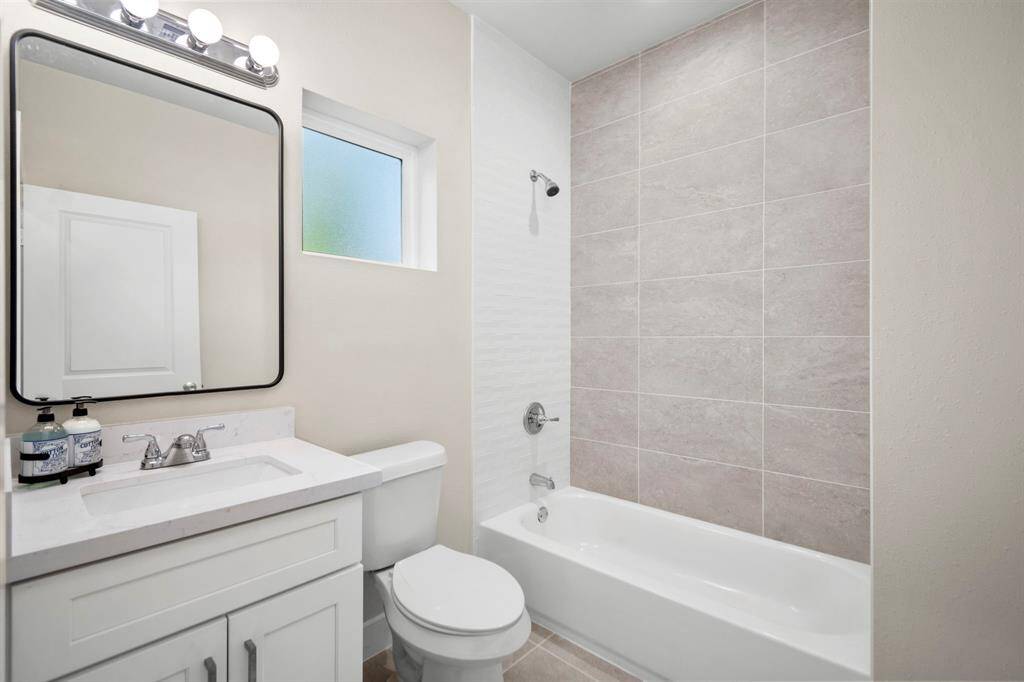 2nd bathroom. Tub + shower combo. Shared by 2nd and 3rd bedrooms. 2nd floor.