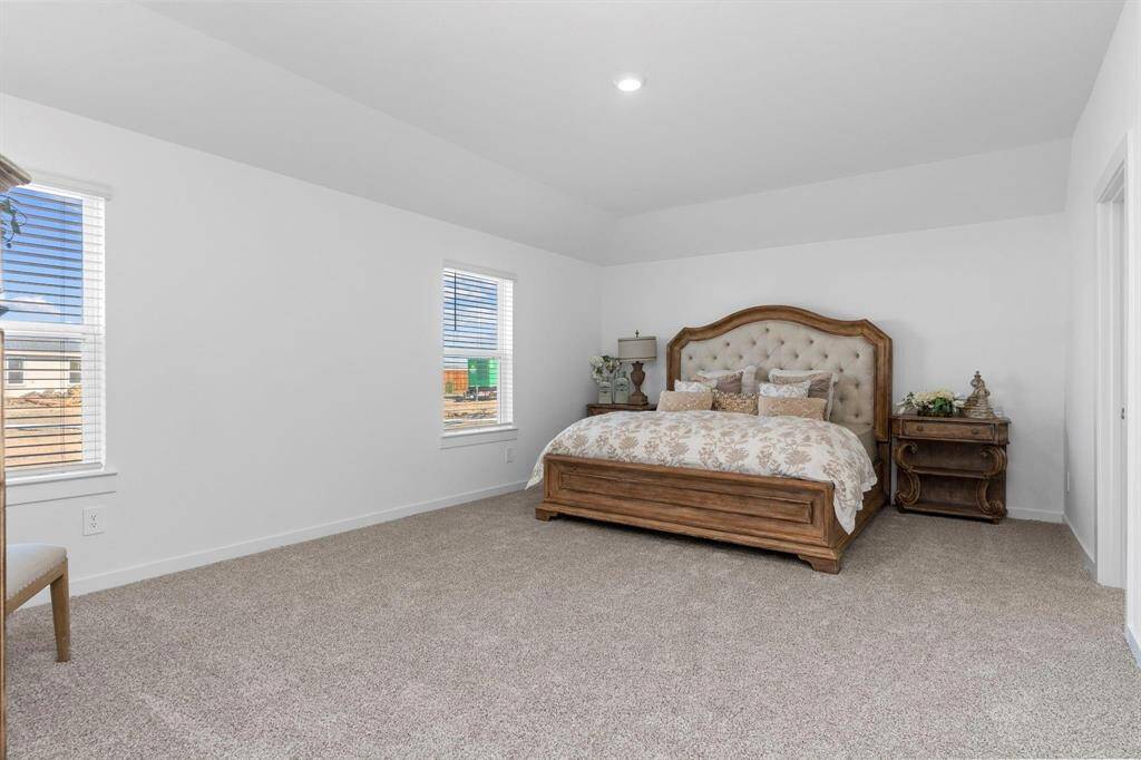 Immense 20x14 primary bedroom. All photos are representative of the home