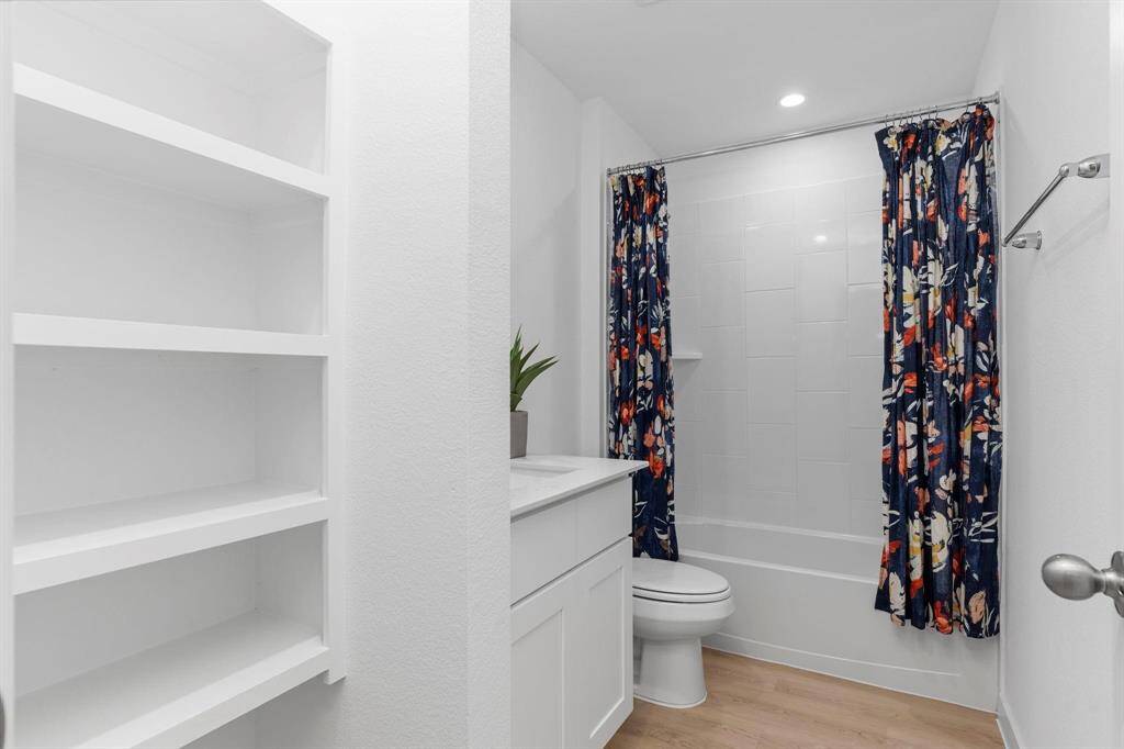 Secondary bathroom. All photos are representative of the home