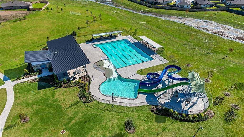 Caldwell Crossing amenity center including pool, water slides, playground, and more!