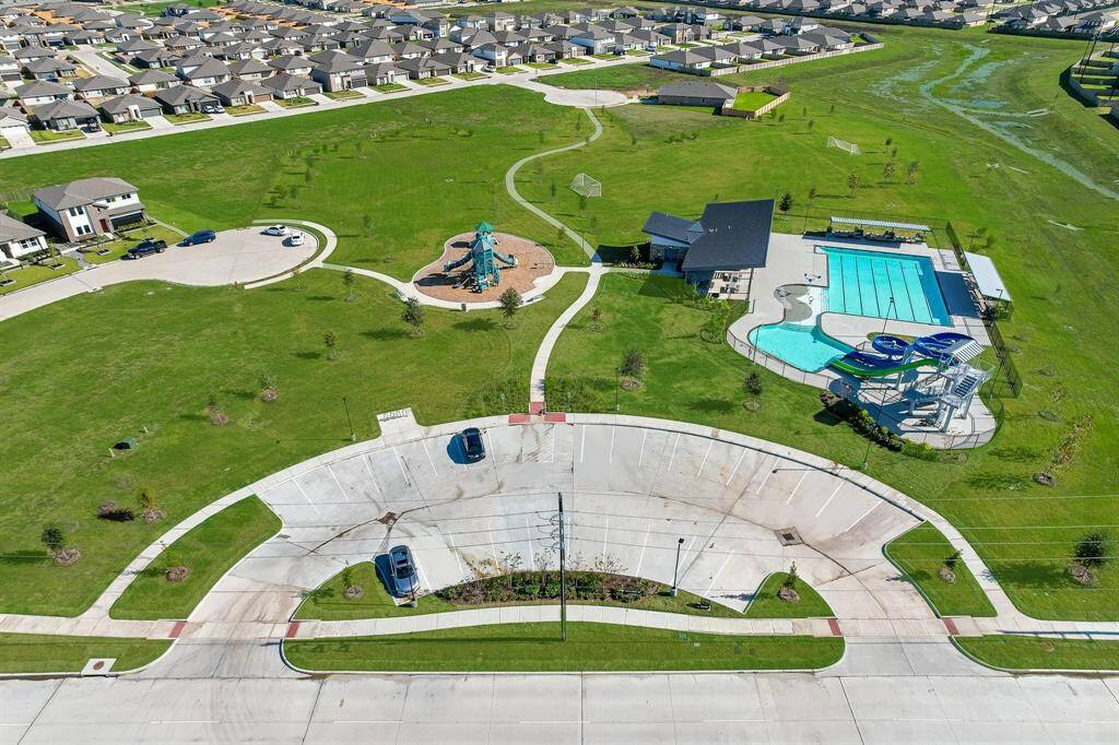 Caldwell Crossing amenity center including pool, water slides, playground, and more!