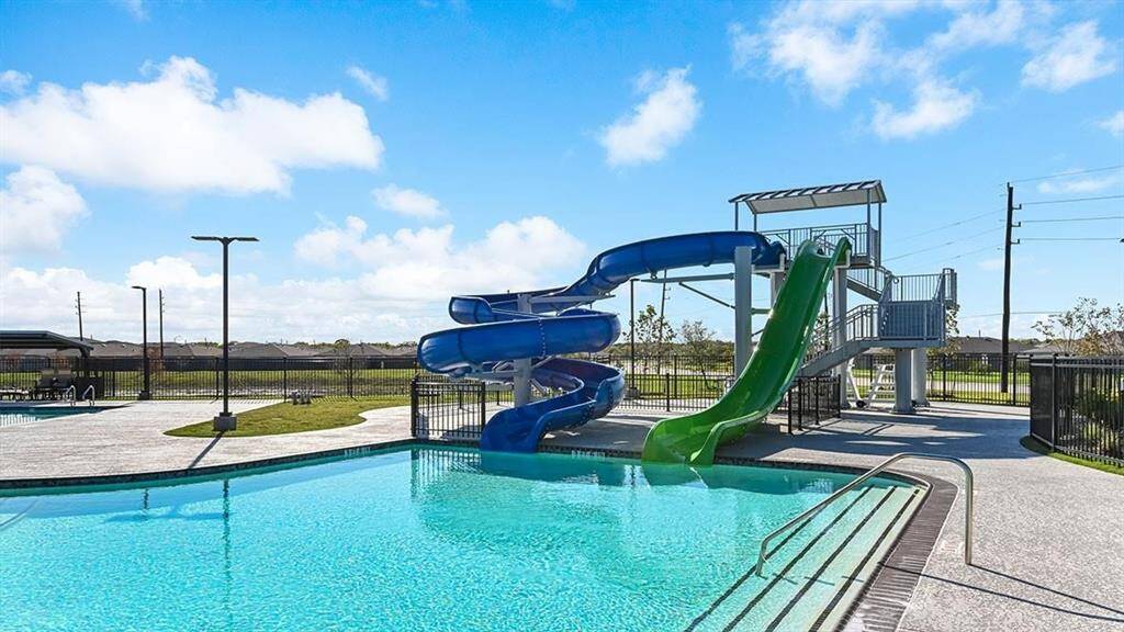 Caldwell Crossing amenity center including pool, water slides, playground, and more!