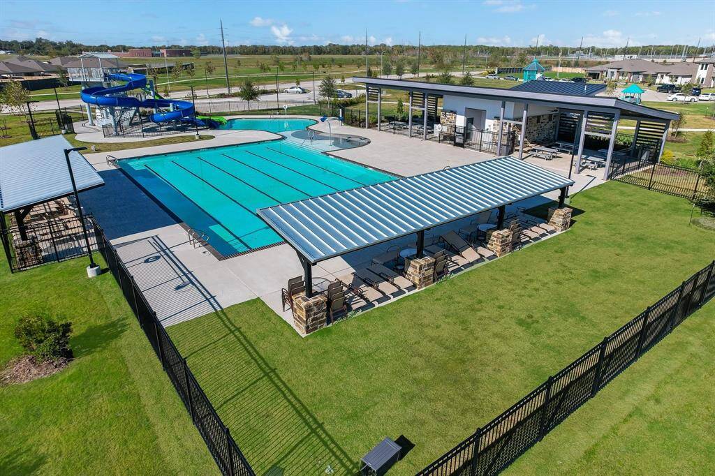 Caldwell Crossing amenity center including pool, water slides, playground, and more!