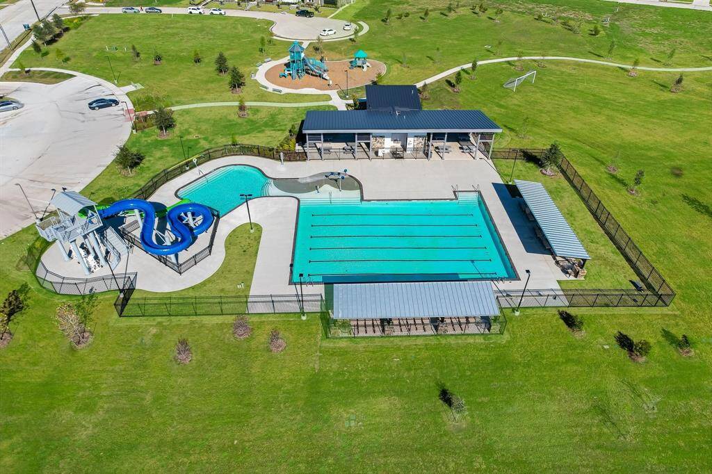 Caldwell Crossing amenity center including pool, water slides, playground, and more!