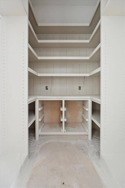 The pantry with amazing storage, drawers, quartz counters for small appliances and shiplap paneling.