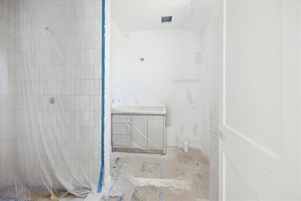 All bathrooms have custom site-built cabinetry, linen closet, Delta plumbing, light fixtures and decorative mirrors. This upstairs secondary bathroom features the Cloe tile by Bedrosians.
