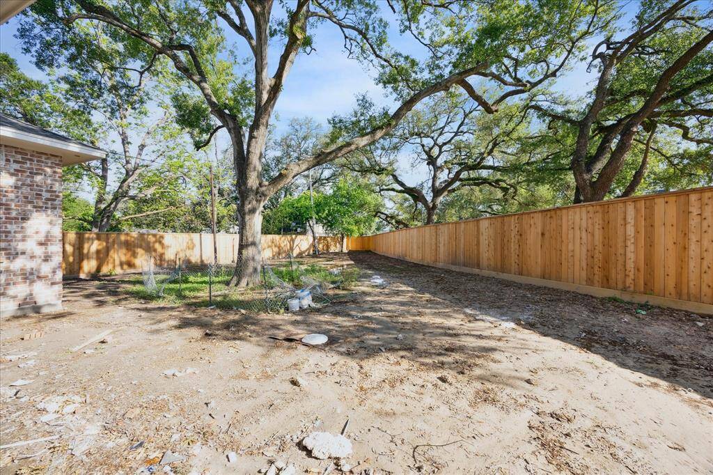 This property has both mature trees and a large backyard, with plenty of room for a pool. The backyard also comes with a new fence all around, so you can enjoy some privacy.