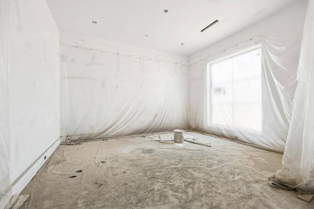 The spacious dining room with oversized window overlooking the front yard. Progress Picture April 2025.