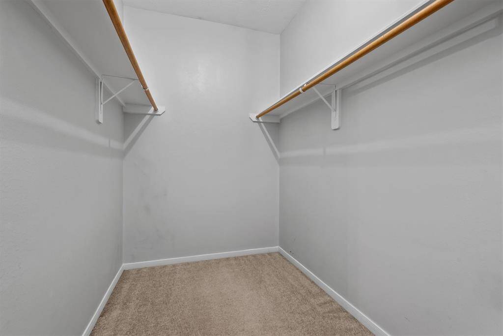 This photo does not show just how large this closet it. Plenty of room for two!