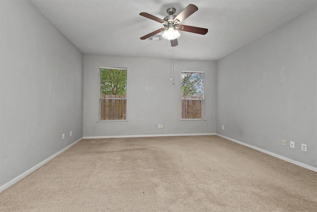 Another view of the primary bedroom.