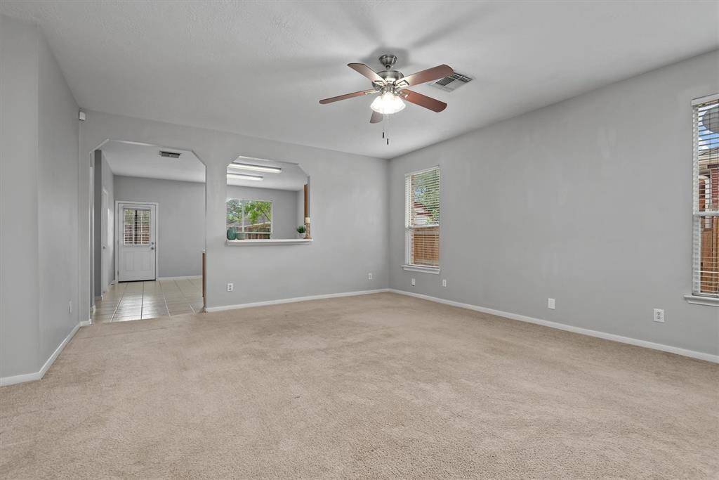 As we move toward the kitchen, you can see how open this space is.