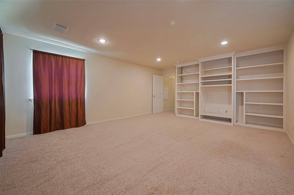 Game room with built ins upstairs