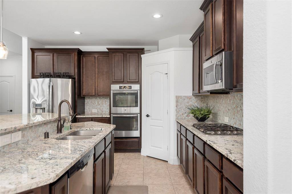 Lots of cabinets and counter top space.