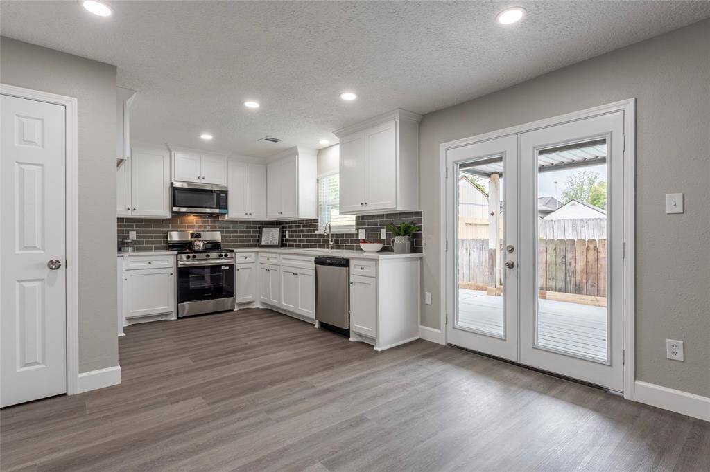 View of Kitchen and French Doors leading to patio