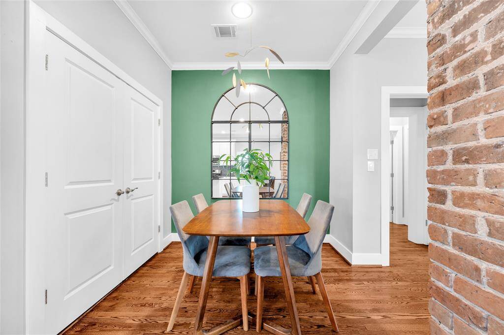 Dining area just offt he kitchen. the full sized Samsung washer and dryer are hidden behind the double doors.