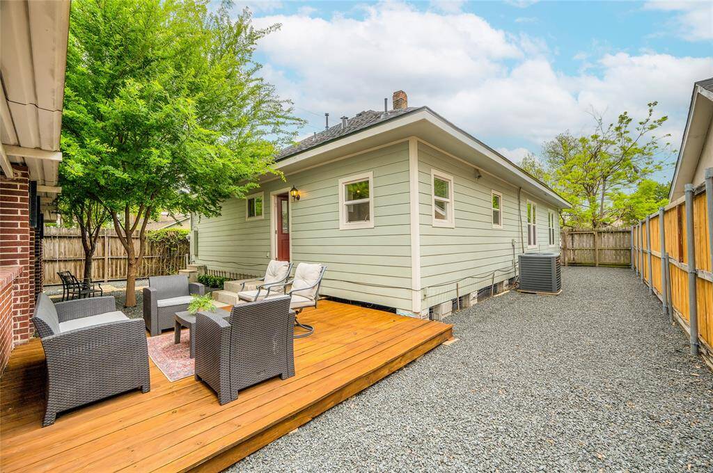 The back deck catches some shade from the trees. The side yard gets full sun - perfect spot for some raised garden beds.