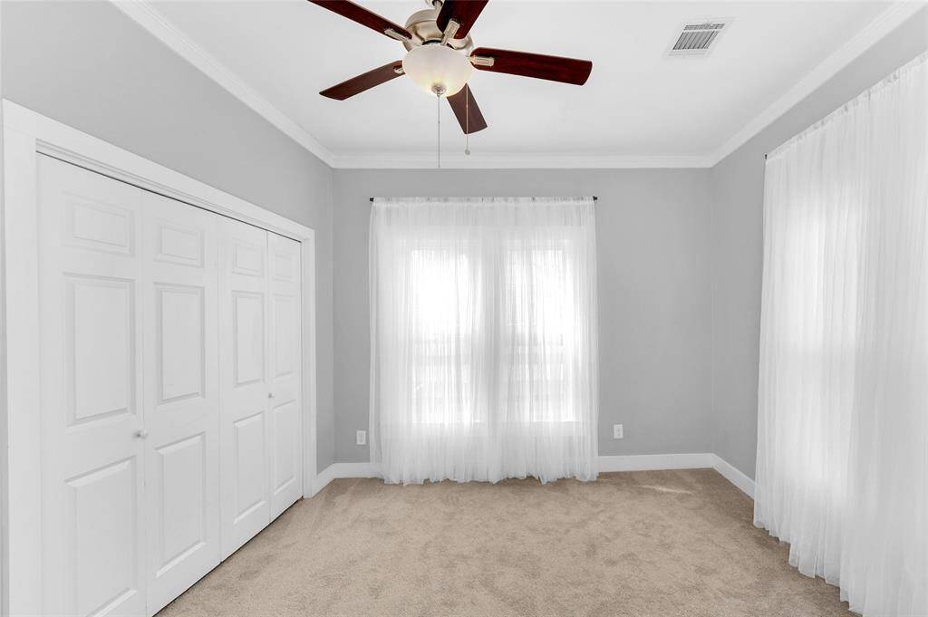 Front bedroom is filled with natural light.
