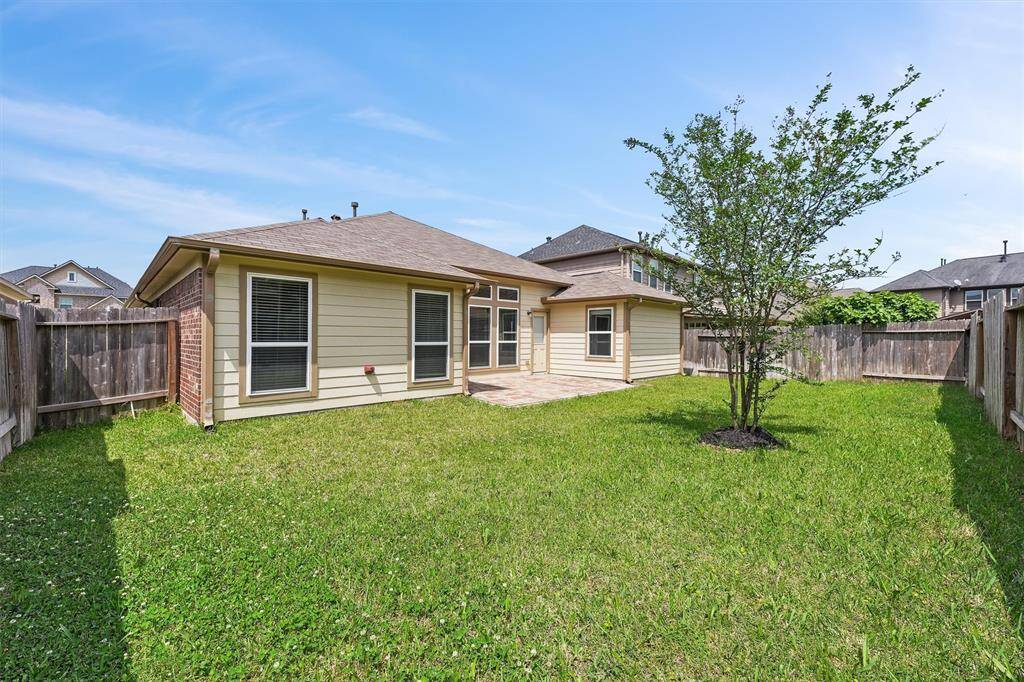 Nice size yard with extended paved patio