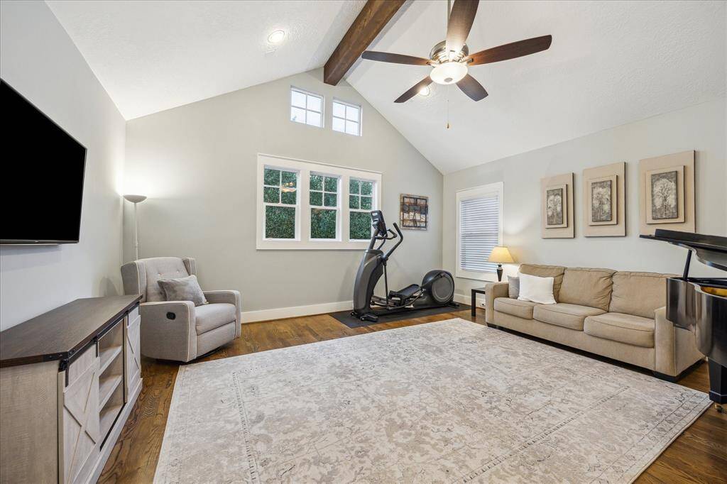 GAME ROOM - Upstairs bonus room with vaulted ceiling and treetop views.