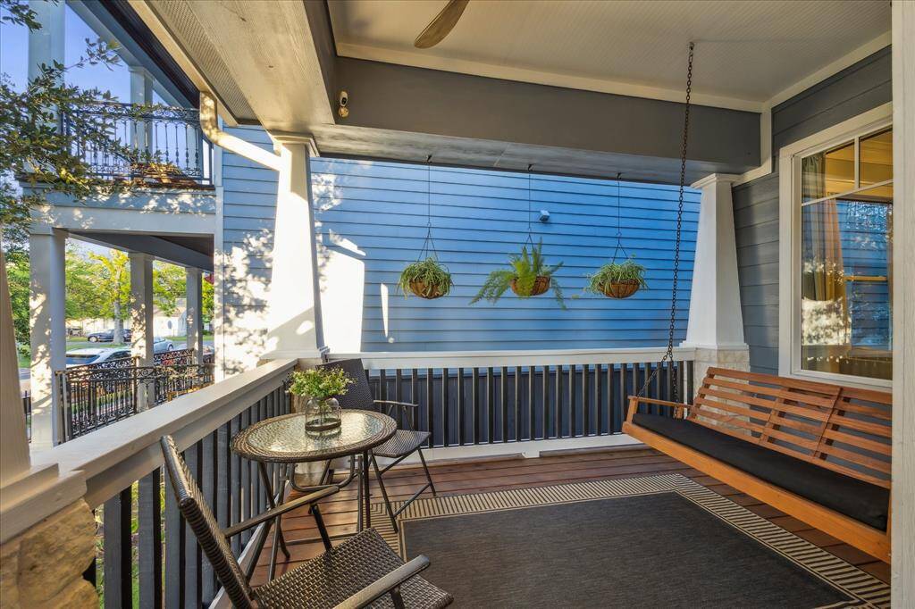 Charming front patio is the perfect place to enjoy morning coffee or an evening cocktail.