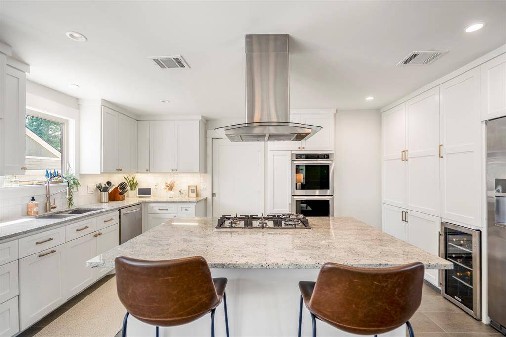 Light, bright, and airy—this kitchen is the heart of the home.