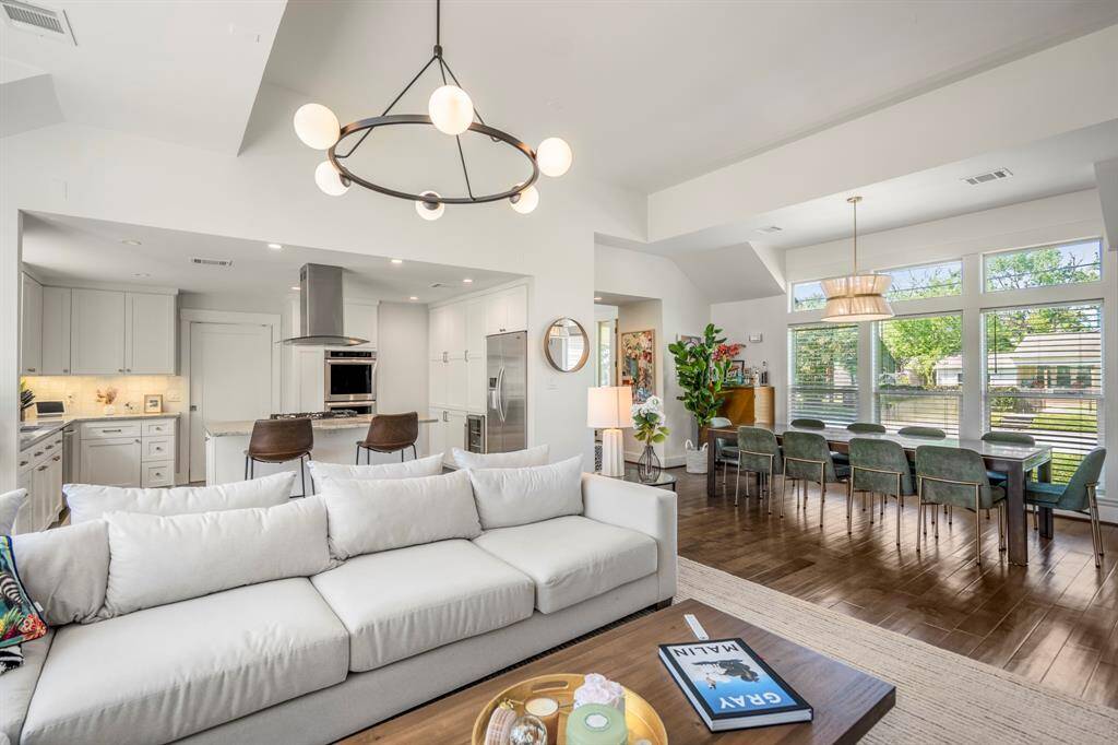 Framed by large windows, the dining area offers natural light from morning to dusk.