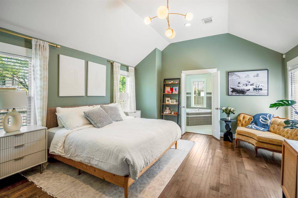 Spacious primary suite with tranquil backyard views and beautiful natural light.