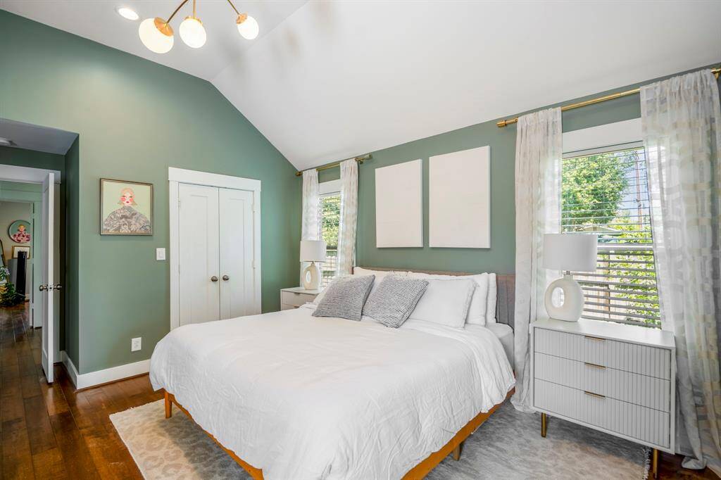 Hardwood floors continue into the serene owner’s retreat—no carpet in sight!