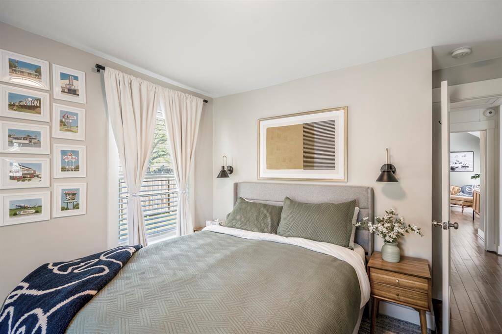 Light-filled guest room with plenty of space for family or visitors.