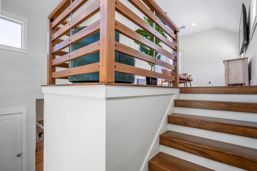Upstairs loft with half bath and private balcony—your perfect creative hideaway.