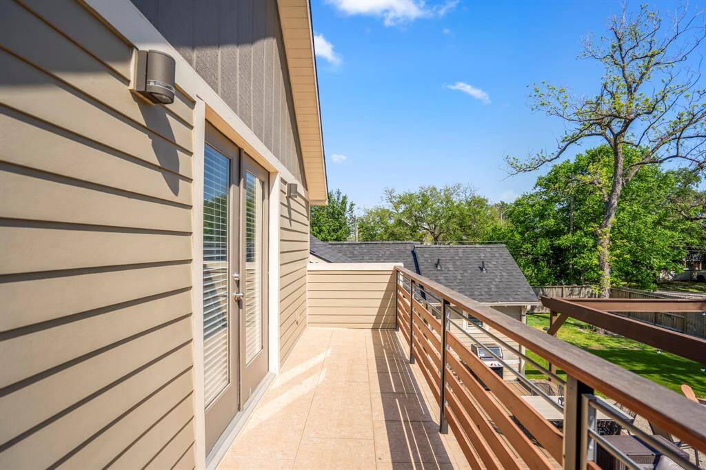 Natural light pours in from every angle in this versatile upper-level retreat.